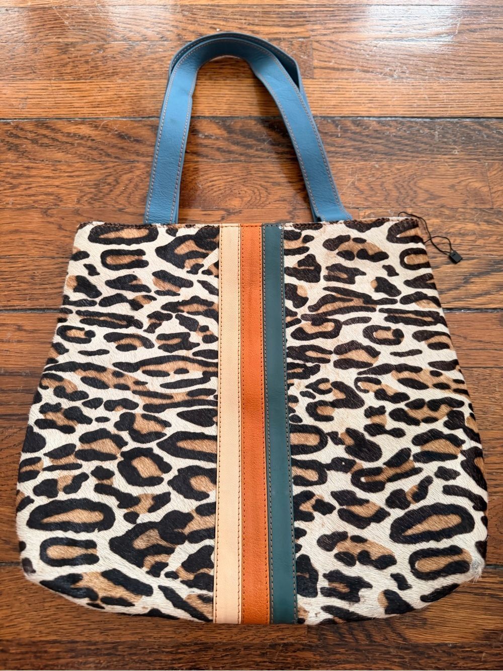 Leopard Print Tote Bag with Blue Handles and Tan Accent